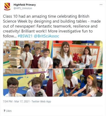 A screenshot of a tweet from Highfield primary school showing small children building tables out of newspaper