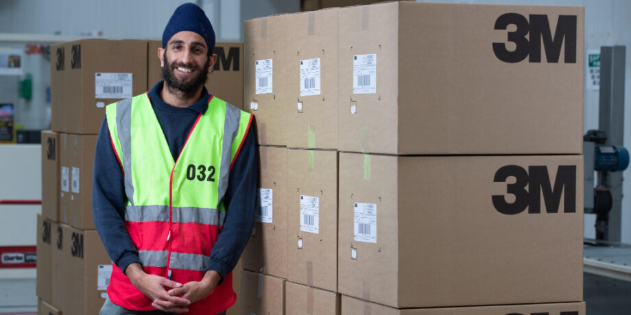 Jaipal next to 3M cardboard boxes